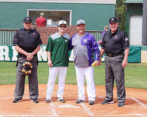 Gordo assistant coach Tray Gilbert and dad James Gilbert pose for a photo before the matchup between Gilbert’s alma mater Geraldine.